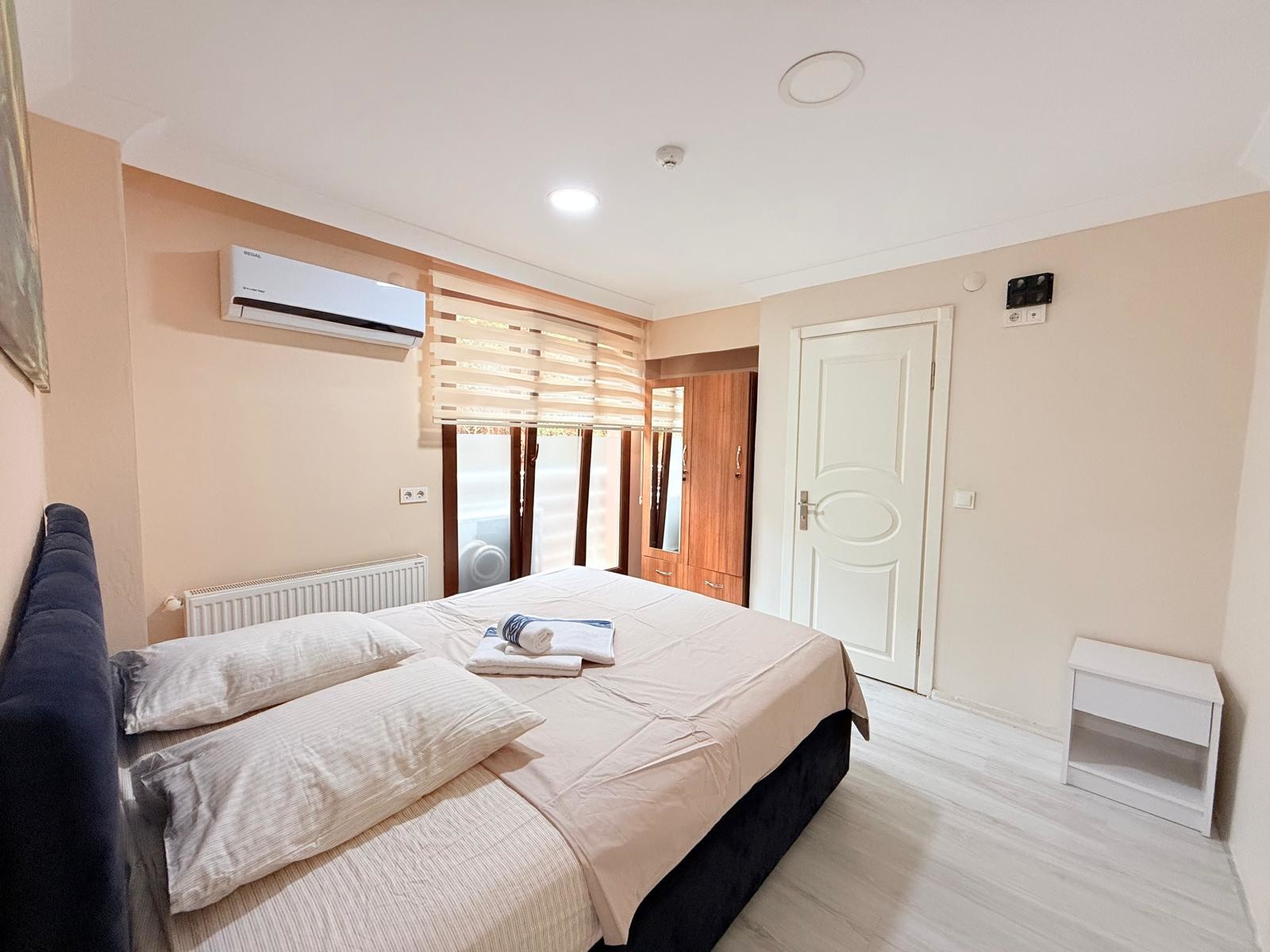 Quad Room *İki Tek Bir Çift Kişilik Oda*